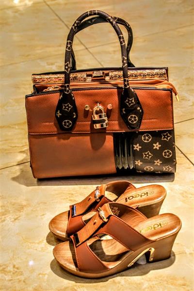 Handbag with high heel slipper