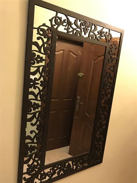 Mirror with wooden frame