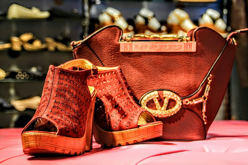 Handbag with high heel sandal